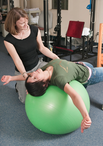 Photo of an instructor and client